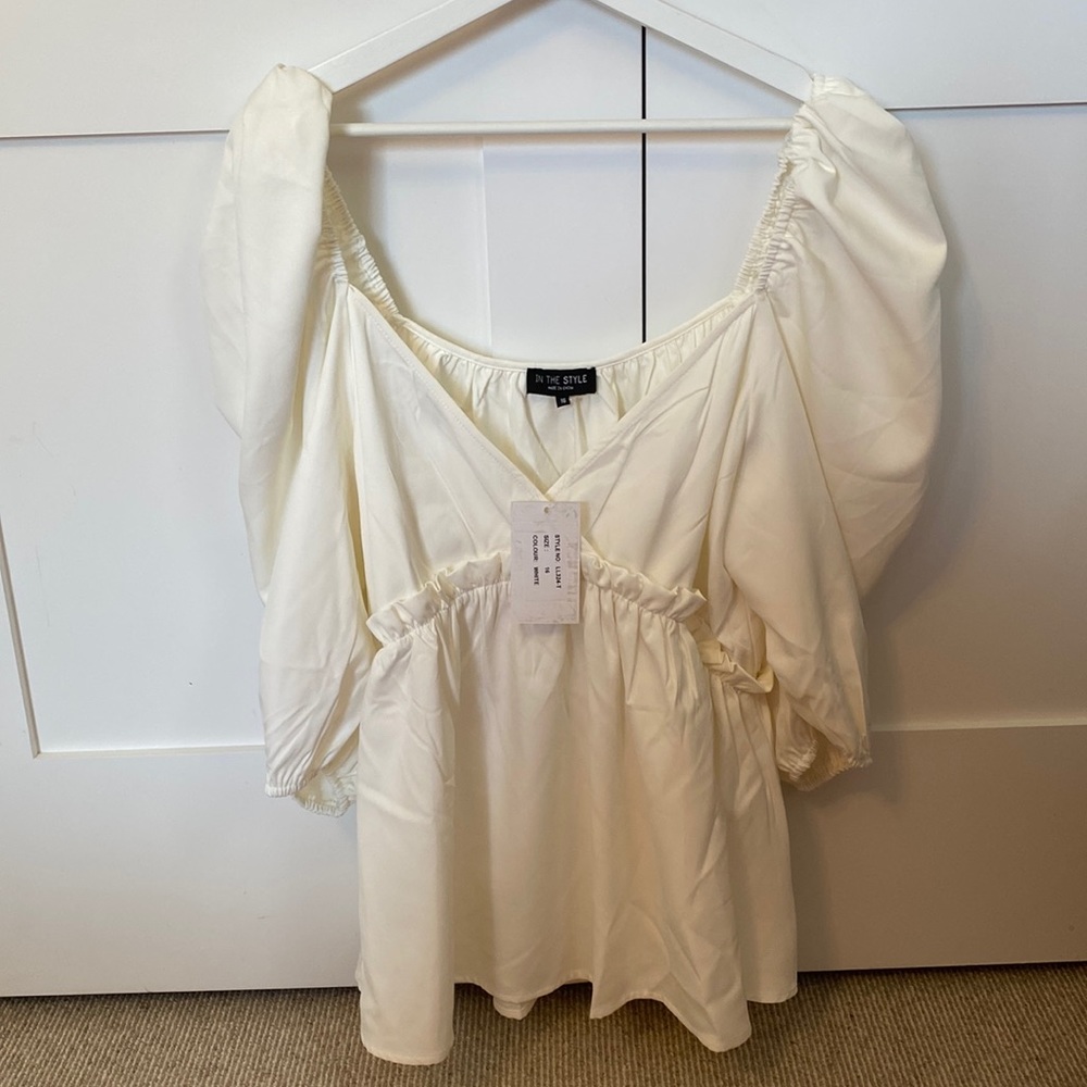 Cream peplum top